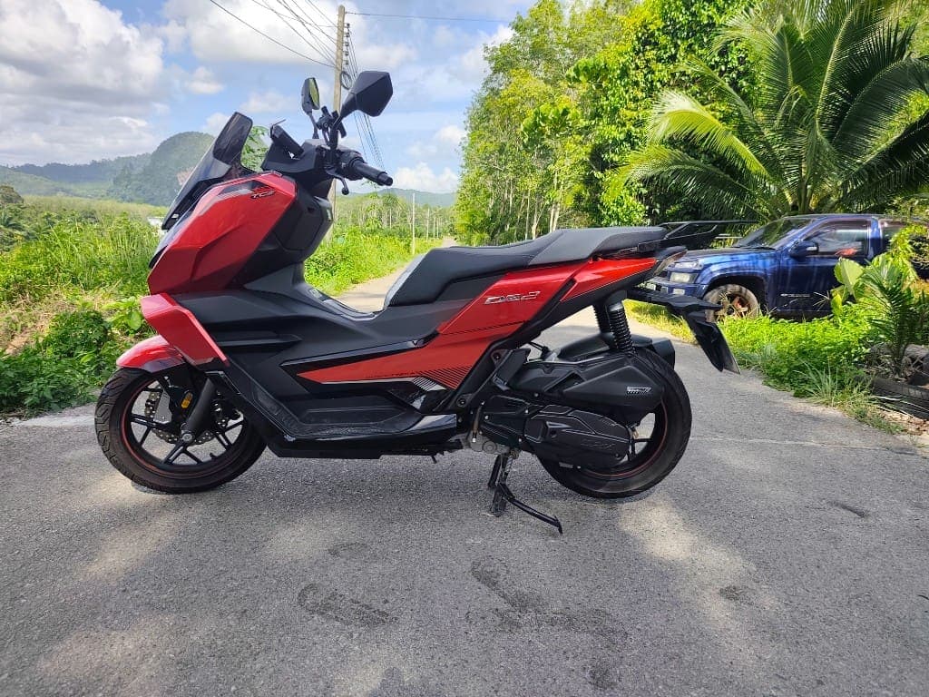 GPX DZ2 side profile on a scenic Krabi road