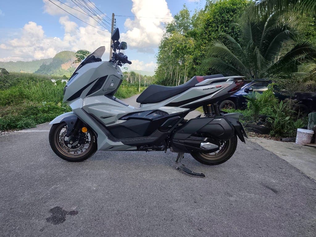 GPX DZ3 side profile on a scenic Krabi road