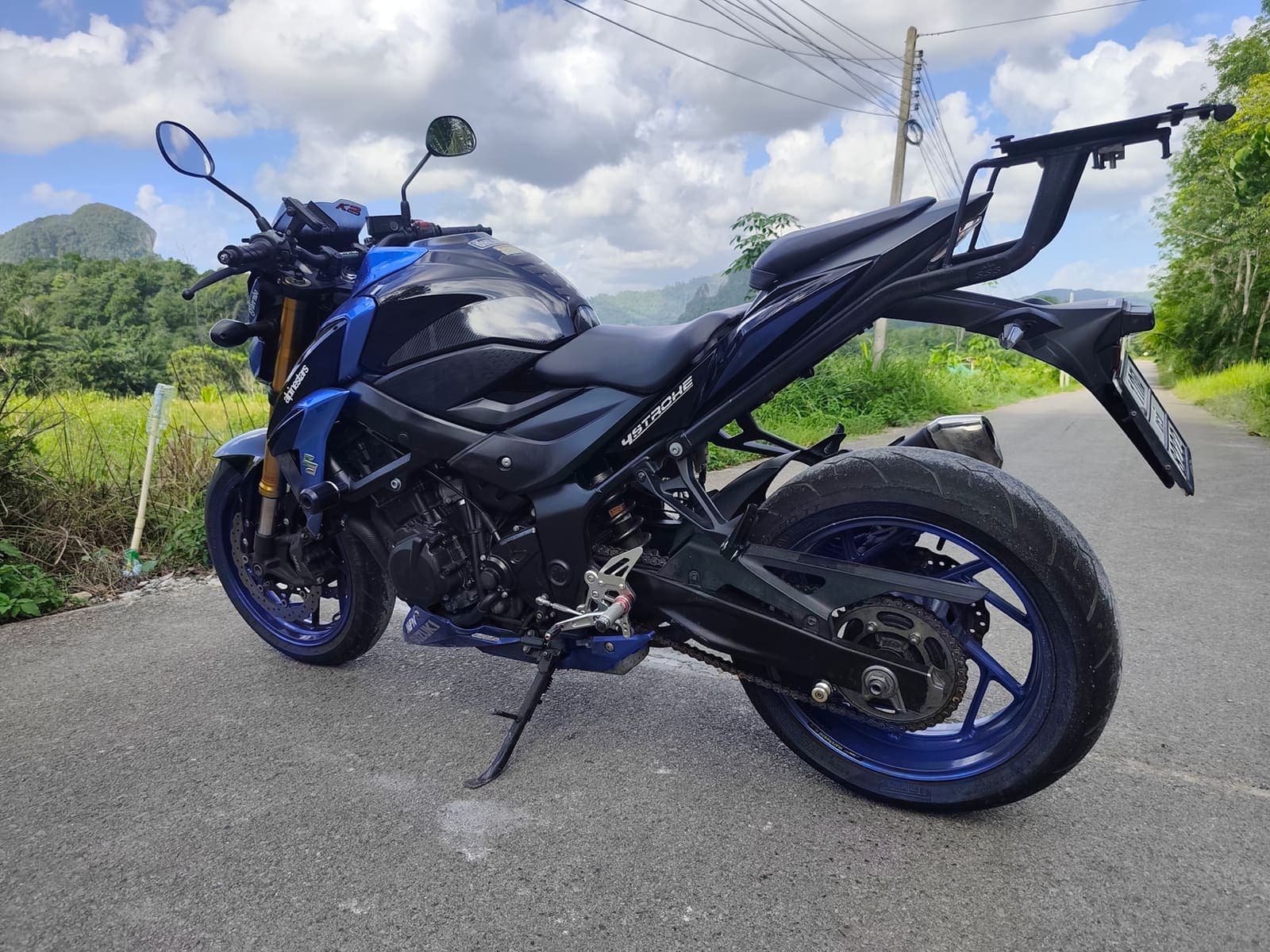 Suzuki GSX-S750 side profile on a scenic Krabi road