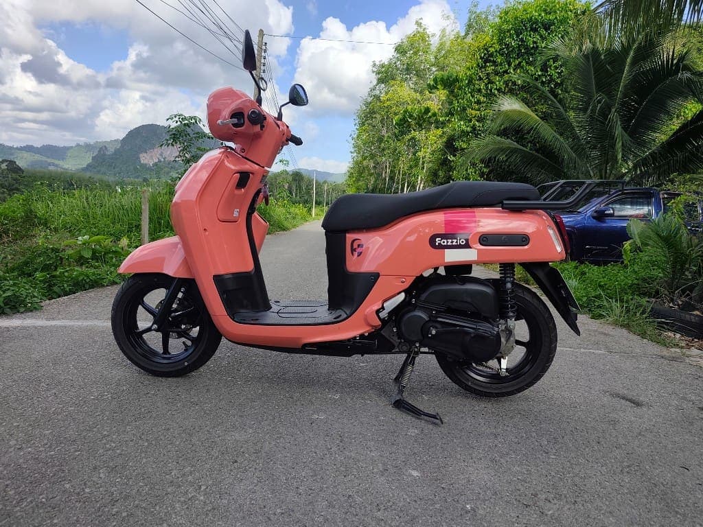 Yamaha Fazzio 125 side profile on a scenic Krabi road