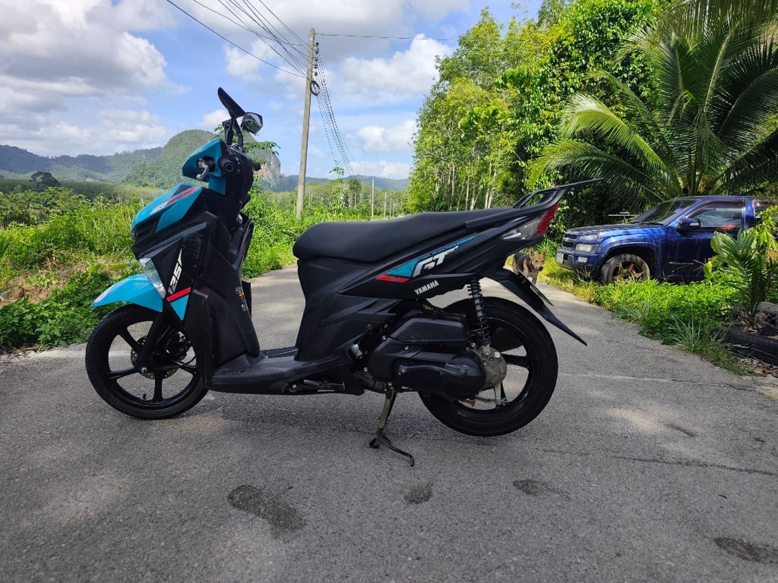Yamaha GT 125 side profile on a scenic Krabi road