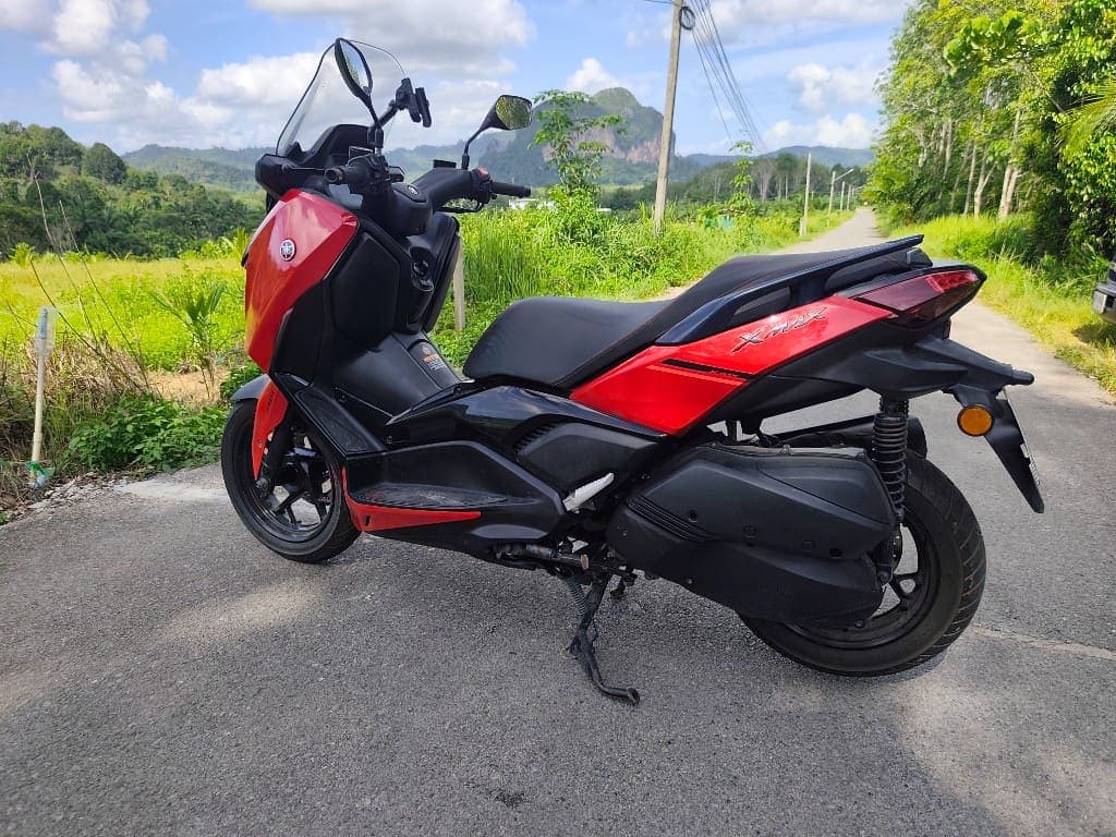 Yamaha XMAX 300 side profile on a scenic Krabi road