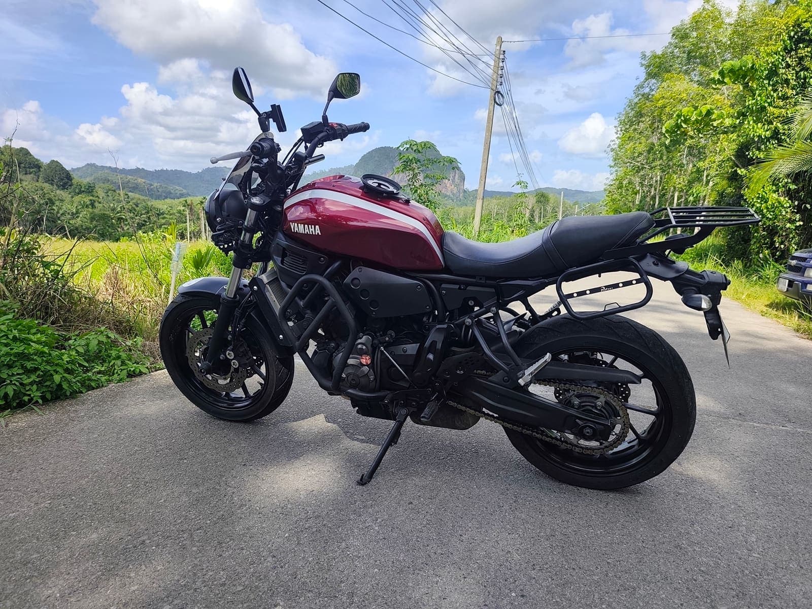 Yamaha XSR700 side profile on a scenic Krabi road