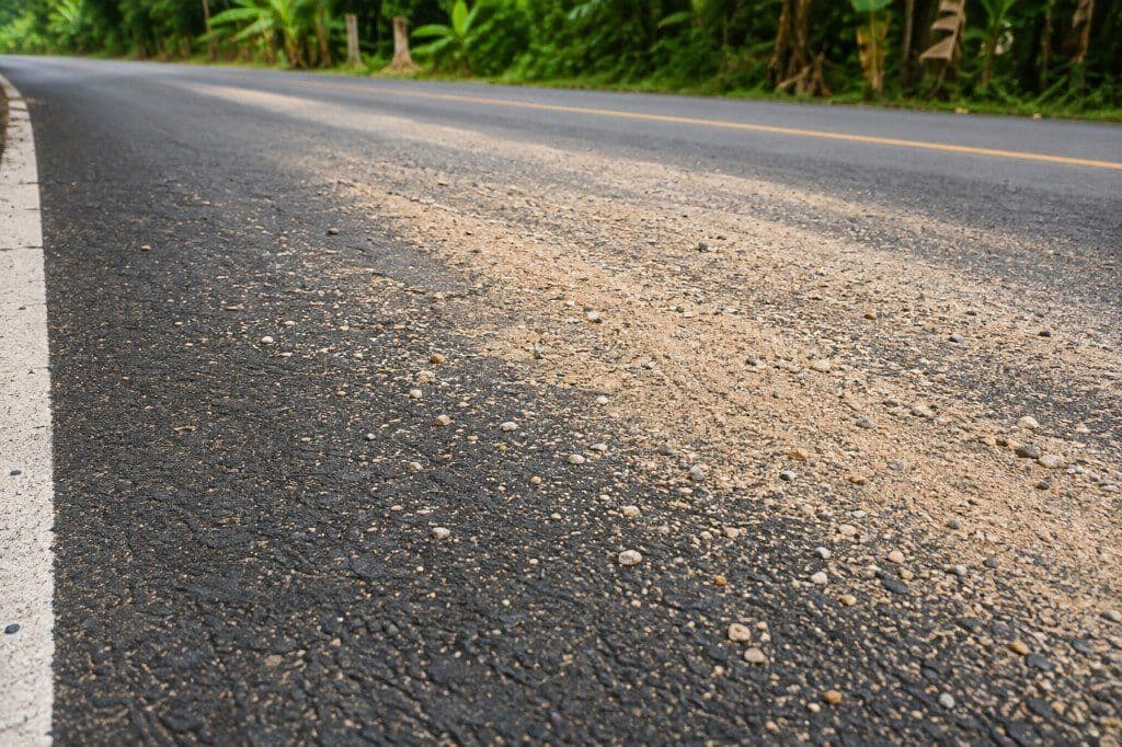Sand and gravel road hazard in Krabi — guidance after a motorbike accident