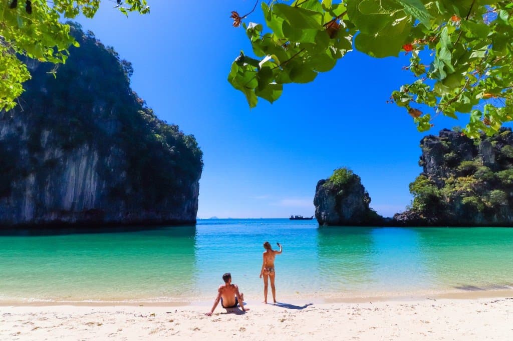 Limestone cliffs and clear water at the Hong Islands — a popular excursion from Klong Muang
