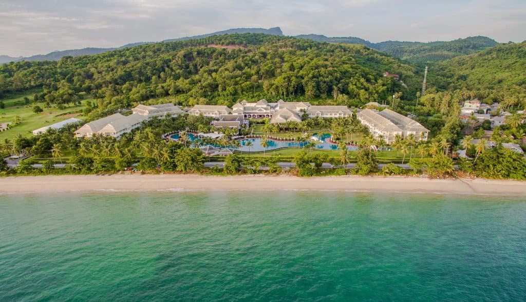 Aerial view of beachfront resorts and turquoise sea at Klong Muang, Krabi