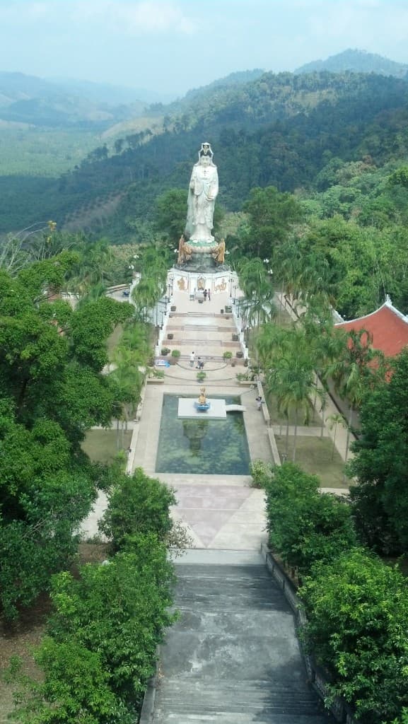 Wat Bang Riang temple courtyard and Guan Yin statue overlooking the valley