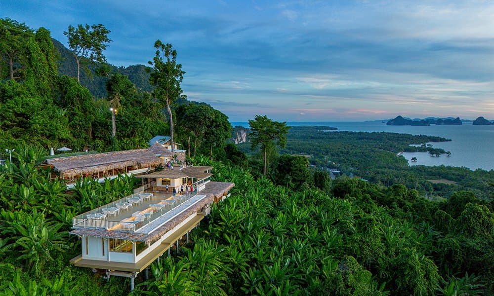 Khaothong Hill — white terrace restaurant overlooking Krabi islands and the Andaman Sea at dusk
