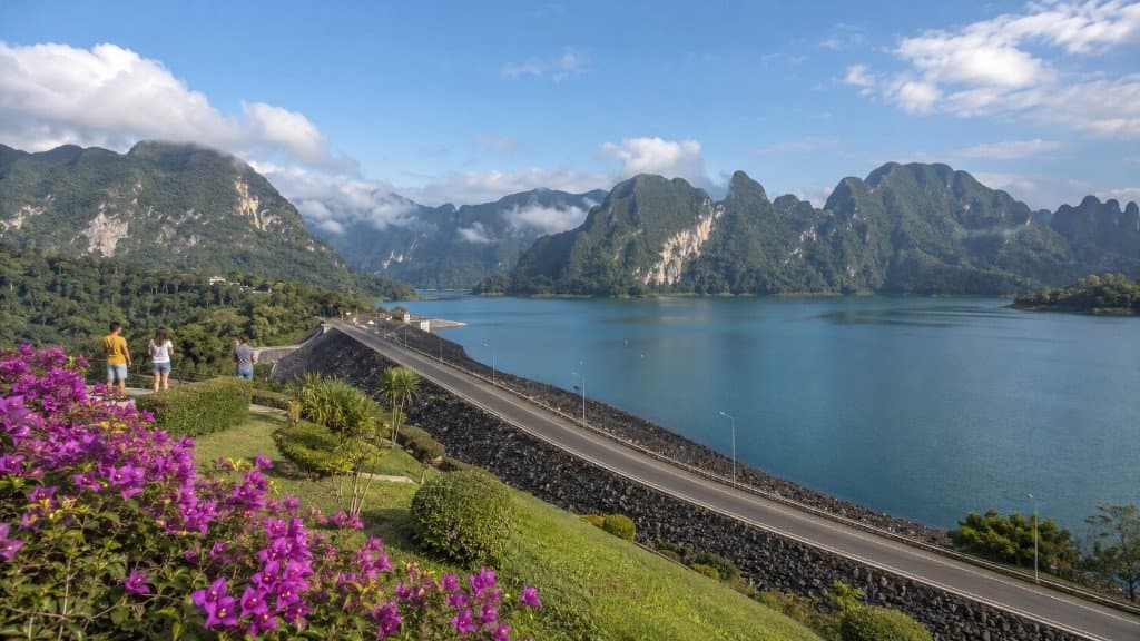 Ratchaprapha Dam and Cheow Lan Lake turquoise water with limestone karsts, Khao Sok