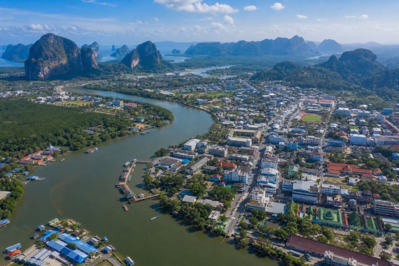 Aerial view of Krabi Town on the river with limestone karsts beyond