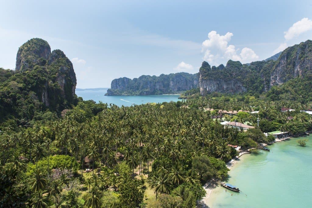Aerial view of Railay peninsula beaches and limestone cliffs from East Railay viewpoint, Krabi